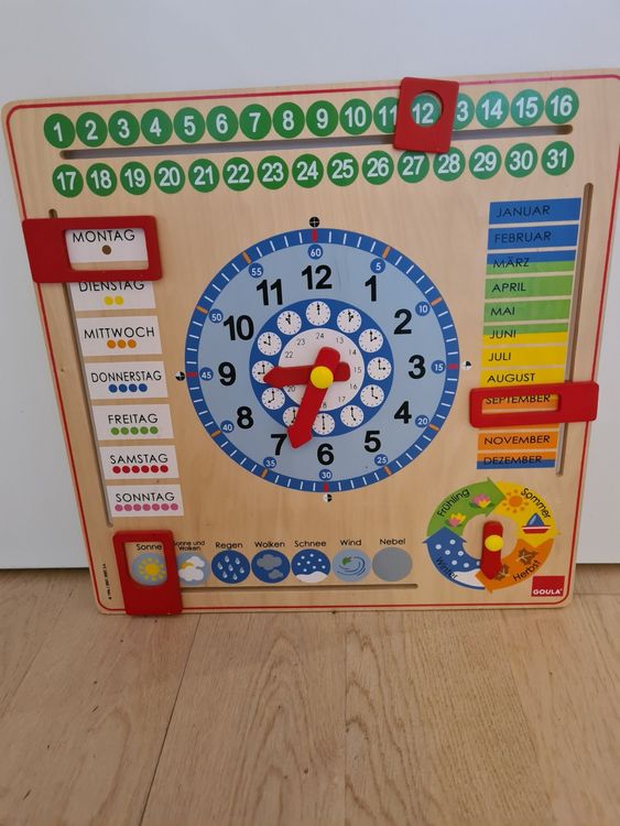 Goula Holz- Kalender Lernuhr  Acheter sur Ricardo