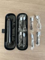 Elektrische Zahnbürste mit Reiseetui + 7 Bürstenköpfen