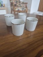 4 tasses Sebring Porcelaine, bordure argentée, comme neuf