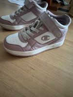 Baskets Champion rose et blanc en bon etat taille 36