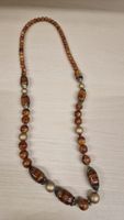 Elegante Vintage Halskette mit Holz und goldenen Details