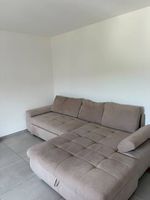 Canapé/lit familial beige en très bon état!!