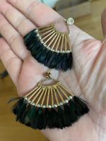 Belles boucles plumes de paon
