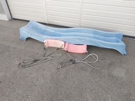 Rutschbahn und Schaukeln