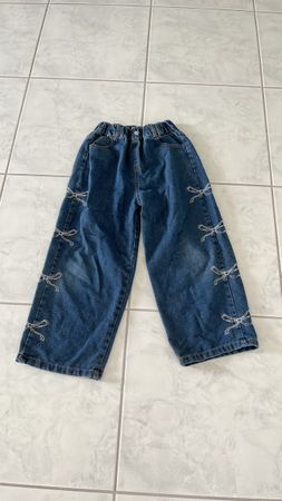 Jeans mit Schleifen-Detail Grösse 140