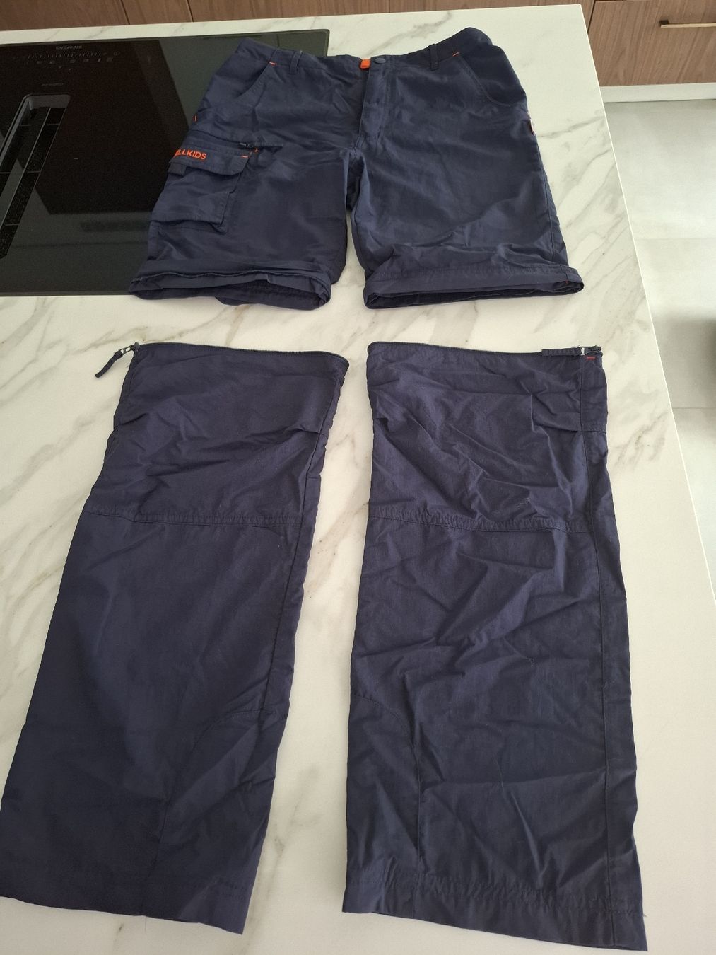 Trollkids Pantaloni: Pantalon Trollkids 170 transformable en short bleu nuit – Usato da Bulle venduto da xixime