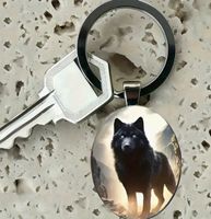 SCHLÜSSELANHÄNGER SCHWARZER WOLF ZINKLEGIERUNG,GLAS NEU