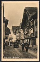 Andermatt, Strassenpartie mit Geschäft