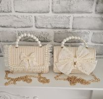 Zwei Stück Handtasche für Kinder mit Perlen und Schleife