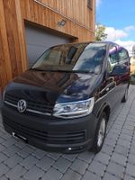 VW Transporter T6 Bus schwarz gebraucht in gutem Zustand