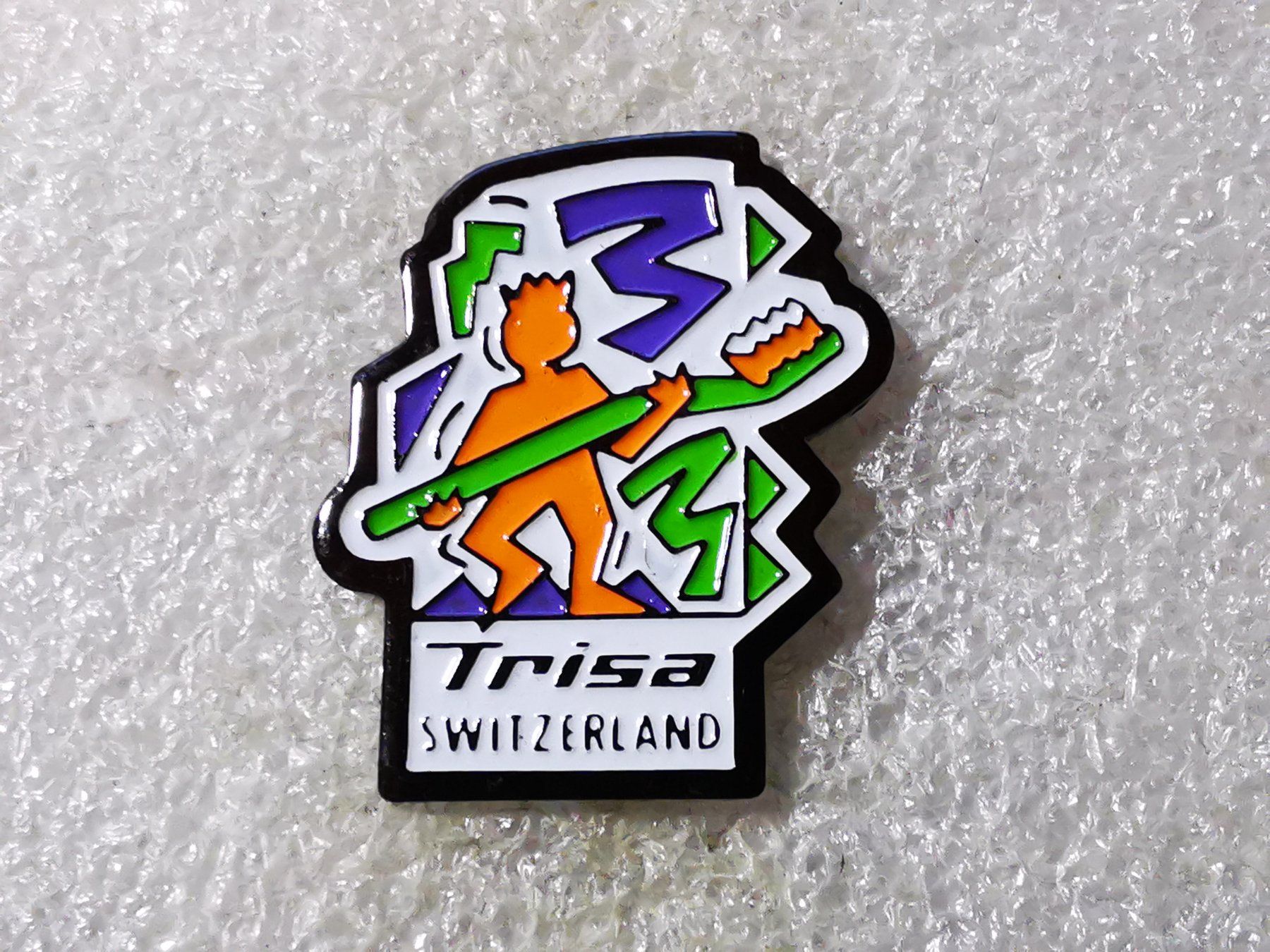 Placchette & Badge: Ansteckpin 56: Trisa Switzerland – Usato da Oppligen venduto da Pin-Fall-Shop