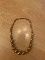 Joli collier en perles brunes claires nacrées