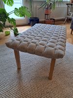 Hocker mit gepolsterter Sitzfläche