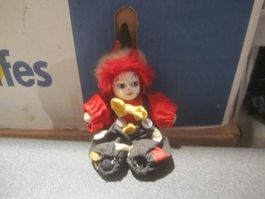 Clown schwarz/roter Anzug