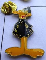 Pin Comics Ente schwarz gelb