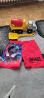 Maillot de bain 122/ 6 ans &  jouets  sables /camion pelle