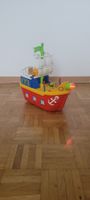 Bateau pirate jouet à roulettes, lumineux  musical 35x35x20 