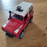 Btuder Land Rover Defender Spielzeugauto rot/weiss