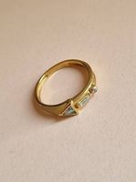 Goldring 375 / 9K mit blauem Topas und Zirkonia