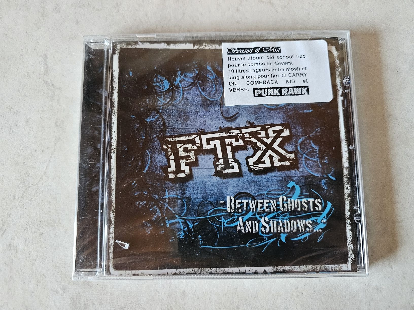 CD: FTX  -  Between Ghosts And Shadows  /  Fabrikneu – Nuovo e nell'imballaggio originale da Schneisingen venduto da backstore24
