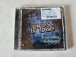 FTX  -  Between Ghosts And Shadows  /  Fabrikneu
