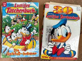 2 Lustige Taschenbücher  beschädigt