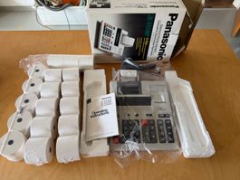 Rechner Panasonic JE-655NP mit Papierrollen