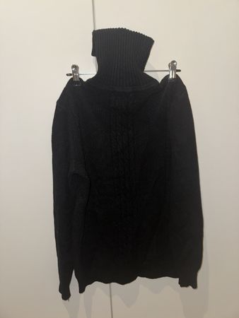 Pull col roulé noir en maille torsadée état correct