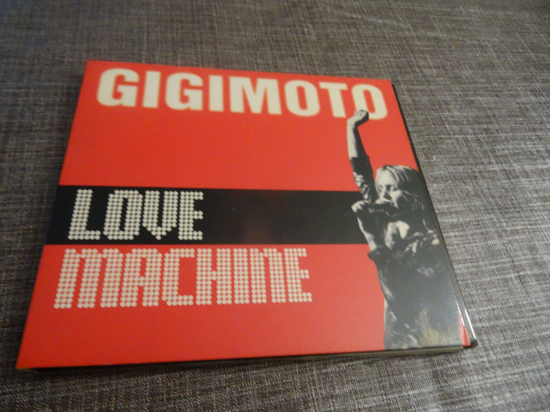 CD: Gigi Moto - Love Machine - CD – Usato da Olten venduto da Disc-Ausverkauf
