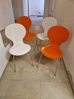 4 Retro Stühle orange/weiss von Conforama