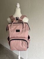 Praktischer Wickelrucksack in Rosa - Viel Stauraum!