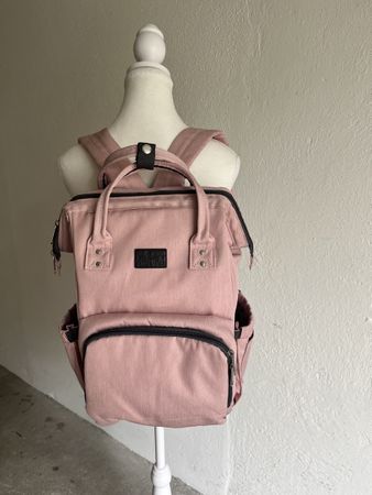Praktischer Wickelrucksack in Rosa - Viel Stauraum!