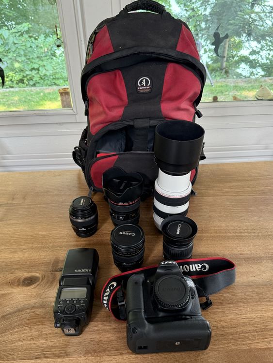 Canon Fotocamera: Fotoausrüstung Canon mit 5 Objektiven, Blitz und Rucksack – Usato da Kleingurmels venduto da Baia0