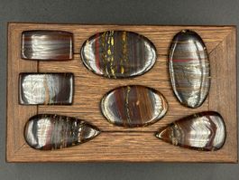 Set aus 7 Cabochons, 100g Tigereisen (Tigerauge Variante)