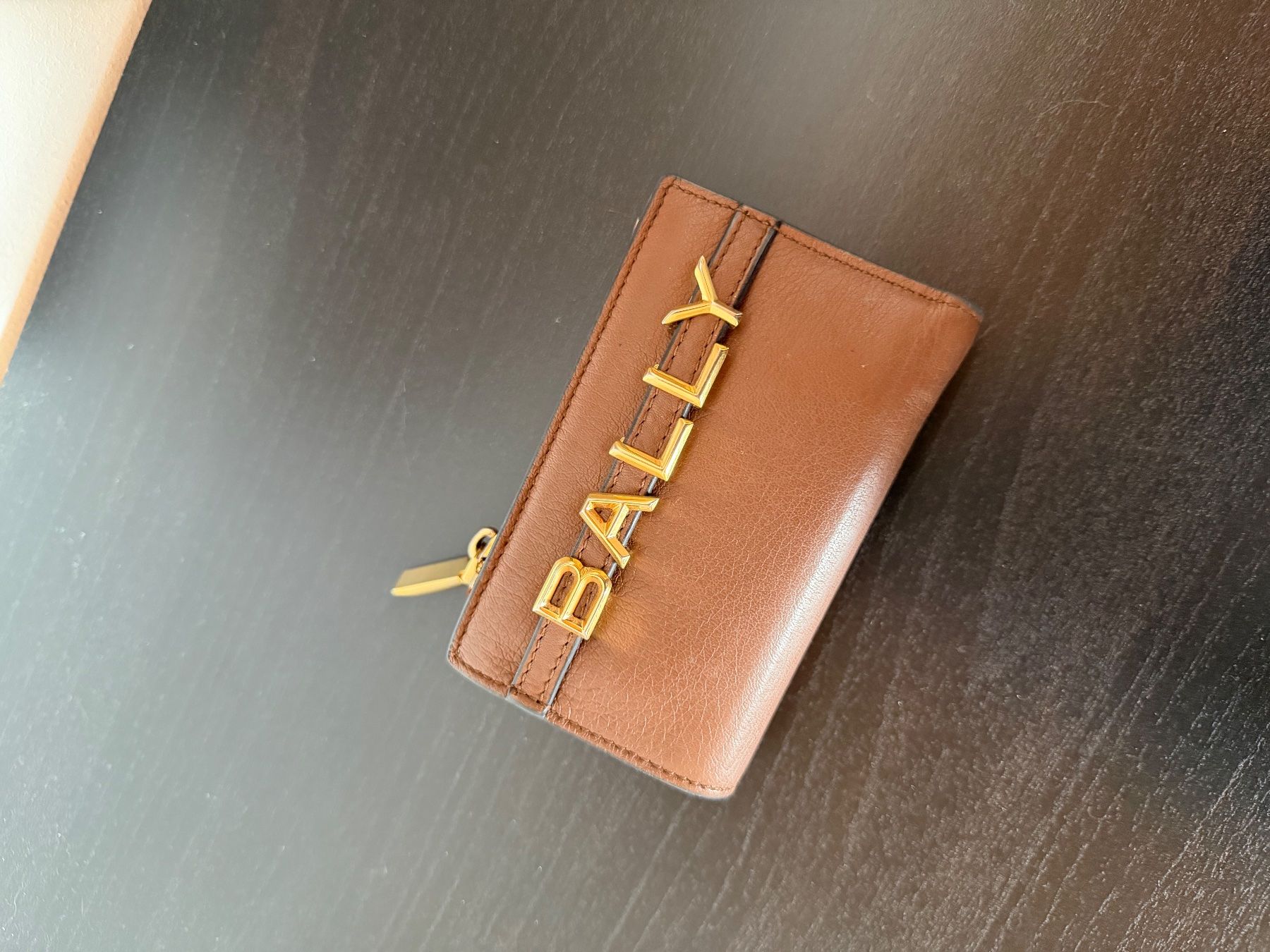 Bally Portafogli: BALLY Geldbörse | Camelfarben – Usato da St. Margrethen SG venduto da Elleiseverywhere