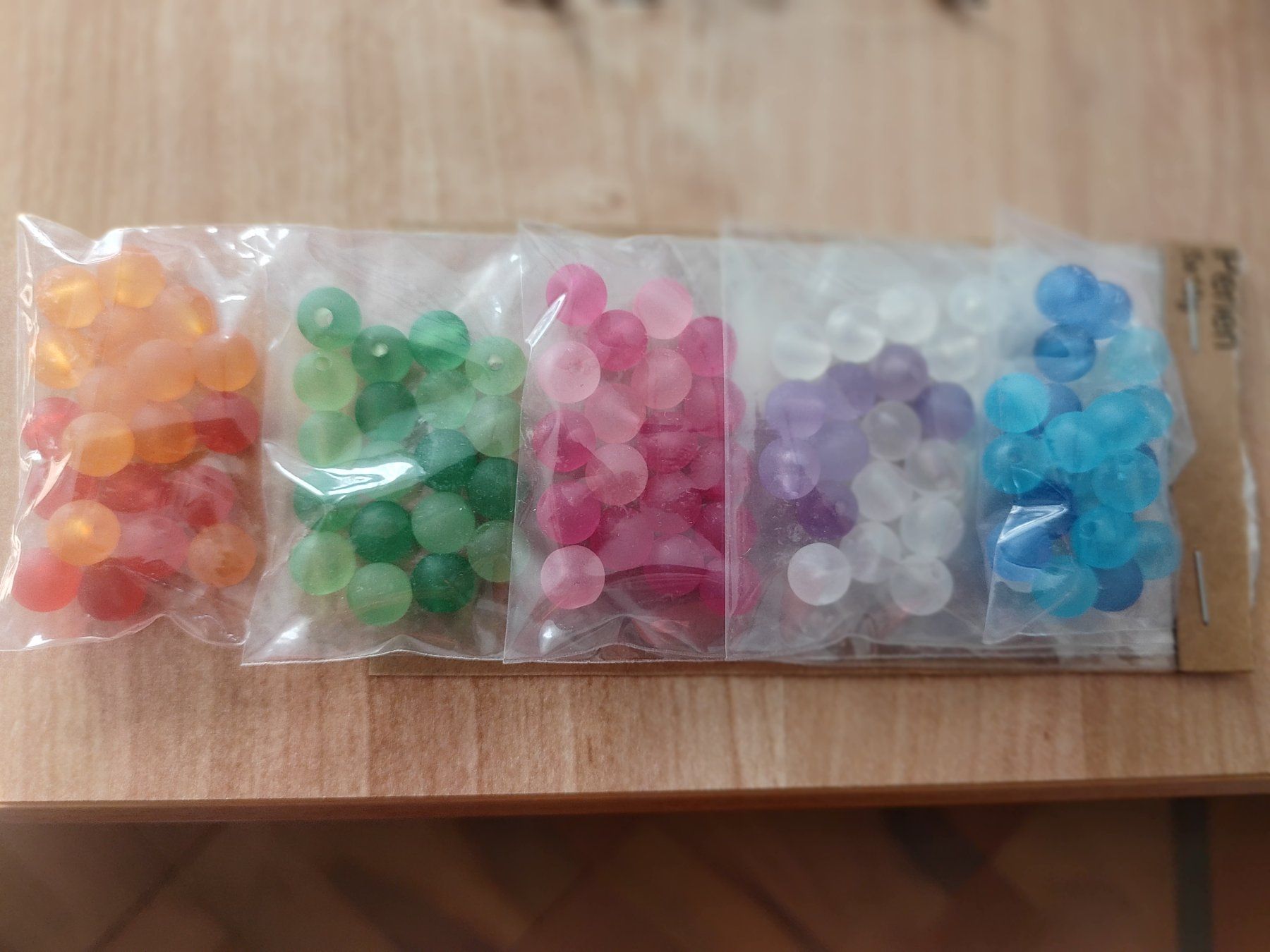 Perlen (unechte): Kunststoffperlen Perles Beads in 5 Farben transparent – Neu und originalverpackt aus Thalwil von ersteigerer 1