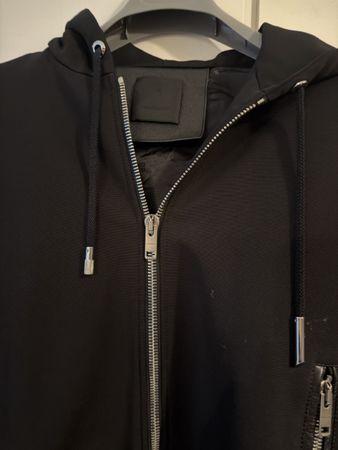 Giacca Givenchy con cappuccio e maniche in pelle, nera