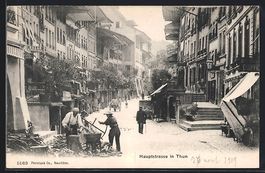AK Thun, Hauptstrasse mit Holzhackern