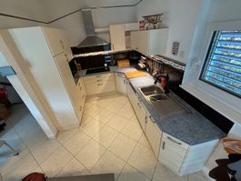 Cuisine en U beige (sans électroménager) bon état