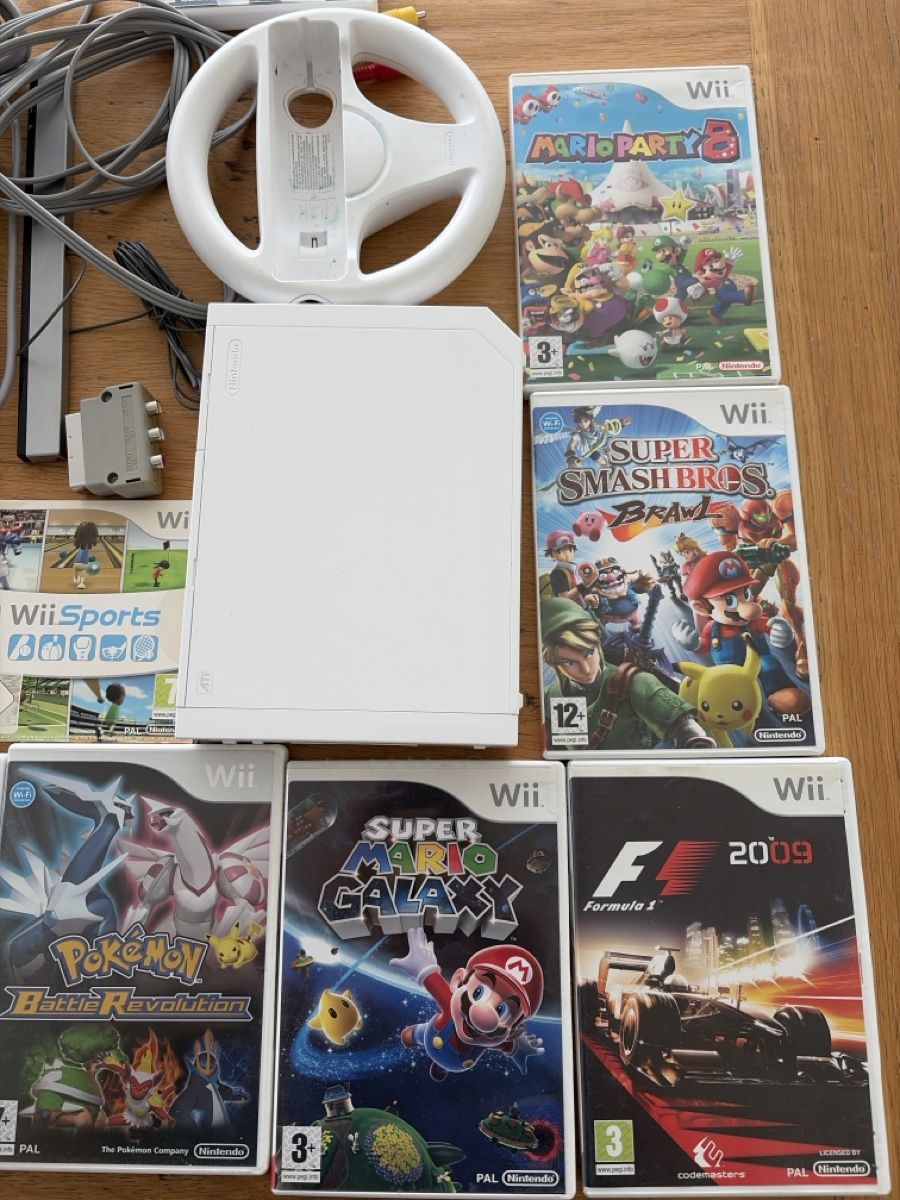 Nintendo Console: Nintendo Wii avec 9 jeux – Usato da Echallens venduto da JAR69 3