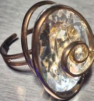 Bague fantaisie avec grande pierre transparente usagé