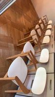 Set of 6 wooden chairs with white seats like new.