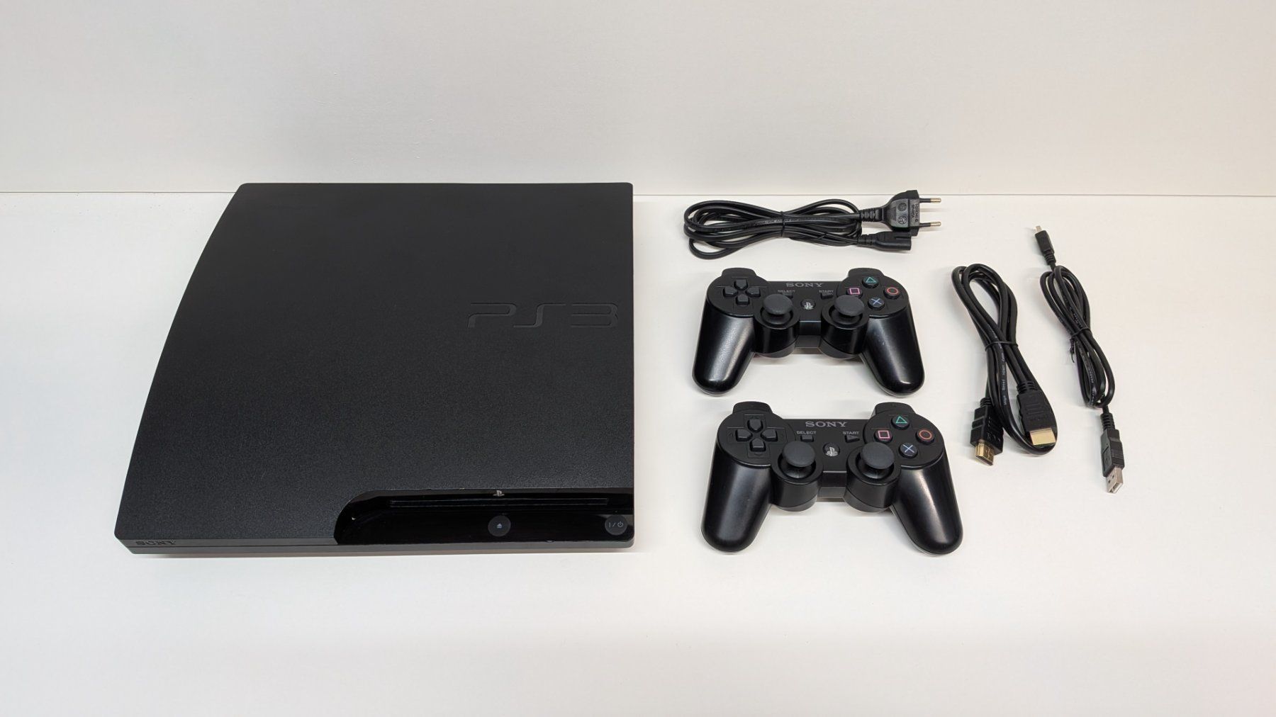 Sony Consoles: PlayStation 3 Slim mit 2 Controller – D'occasion à Menziken par mame18
