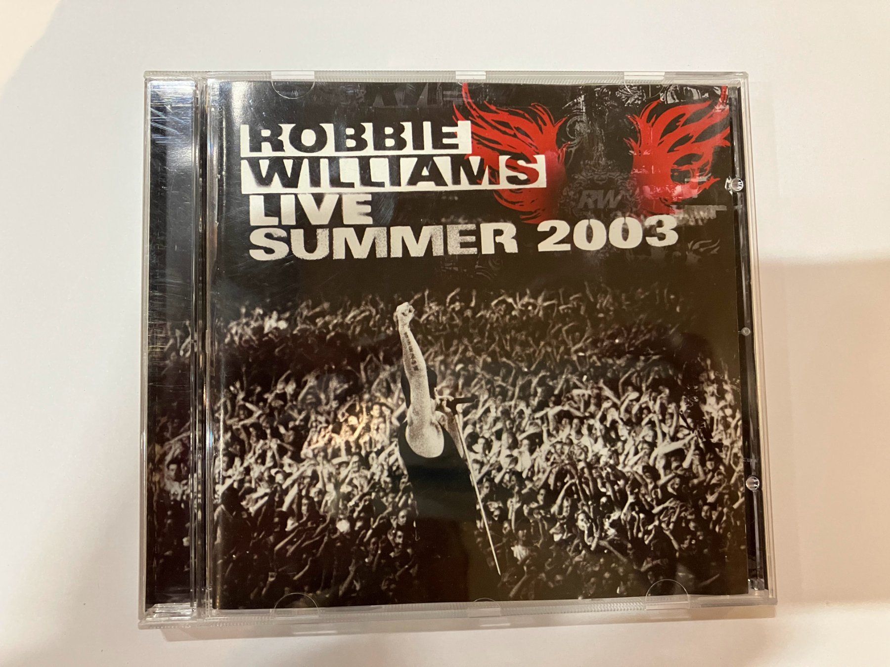 CD: CD Robbie Williams "Live Summer 2003" – Usato da Winterthur venduto da Heftith