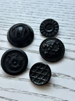 Antike schwarze Glasknöpfe