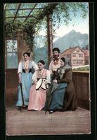 Schweizer Frauen und Mann in Tracht auf 