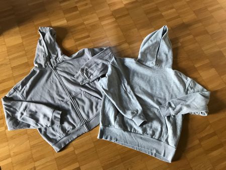 Zwei Kapuzenpullover grau mit Reissverschluss gebraucht