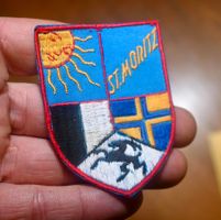 VINTAGE Badge ST. MORITZ STG STICKEREI sonne/wappen h-blau