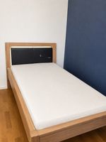 Bett 100x200 cm mit beleuchtetem Kopfteil – guter Zustand