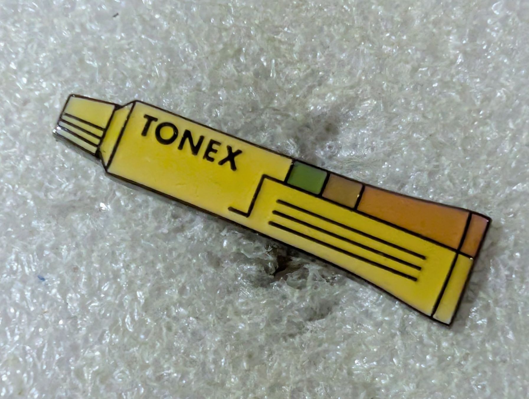 Placchette & Badge: Ansteckpin 112: Tonex – Usato da Oppligen venduto da Pin-Fall-Shop